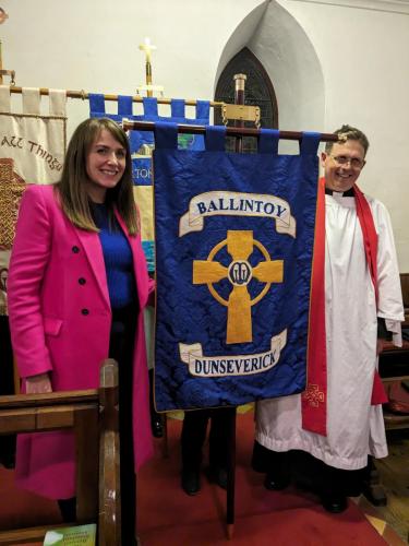 Rev Patrick Barton pictured with the new banner and the Branch Chair.